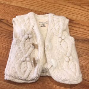 Adorable cream sweater vest